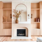 built-ins cheminee marbre miroir arche mobilier bois sur mesure